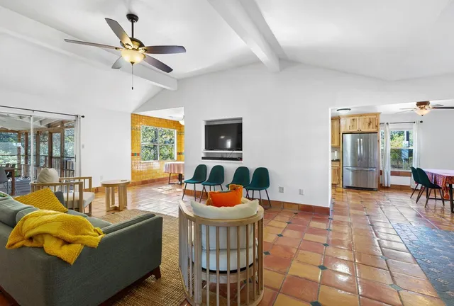 a very nice looking kitchen with a large window