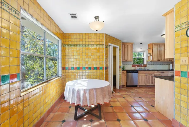 a kitchen with granite countertop lots of counter top space
