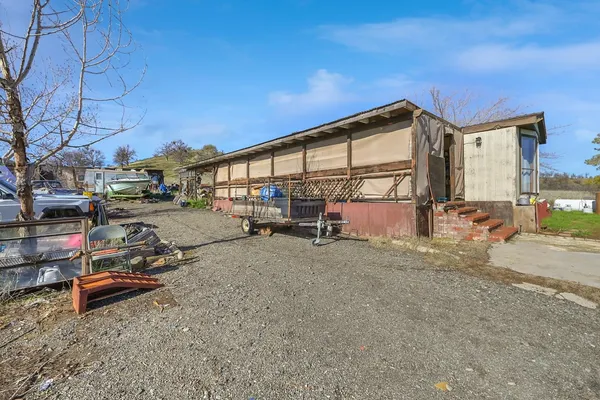 a view of a garden with a houses