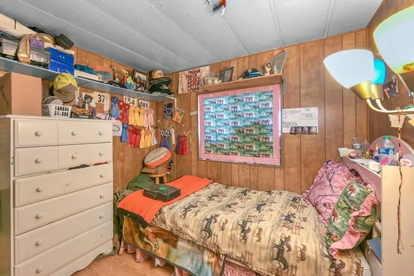 a bed room with a bed and a bed