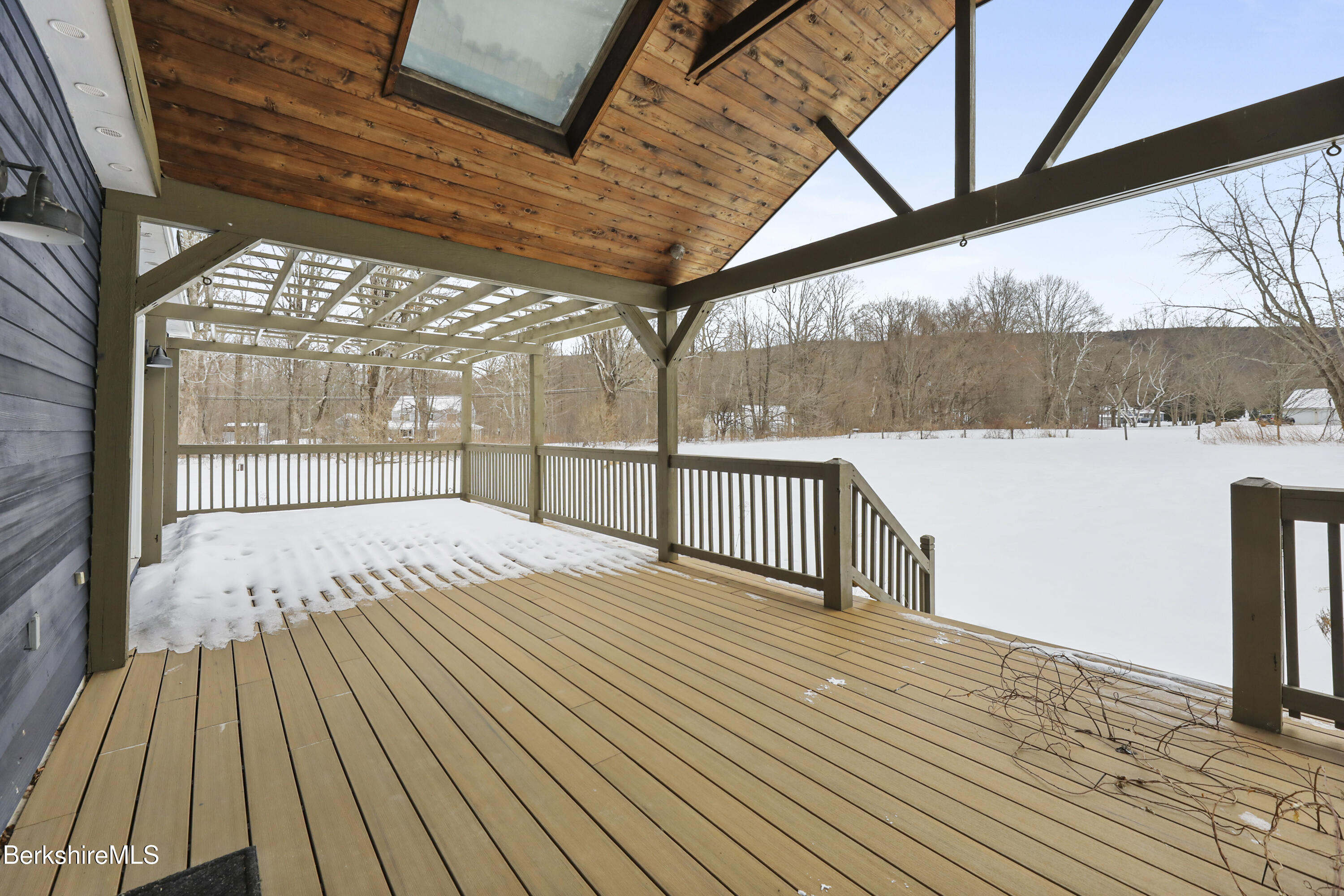 11 E Road Richmond, MA 01254 - Photo 12 of 65 a view of a balcony with wooden floor