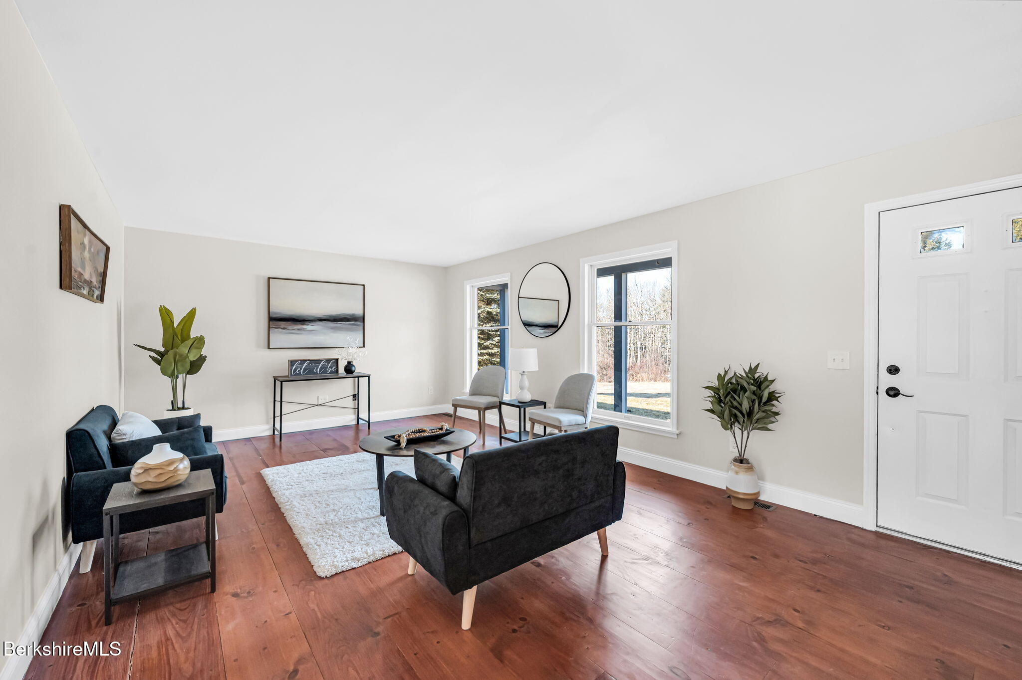 11 E Road Richmond, MA 01254 - Photo 28 of 65 a living room with furniture potted plant and a window