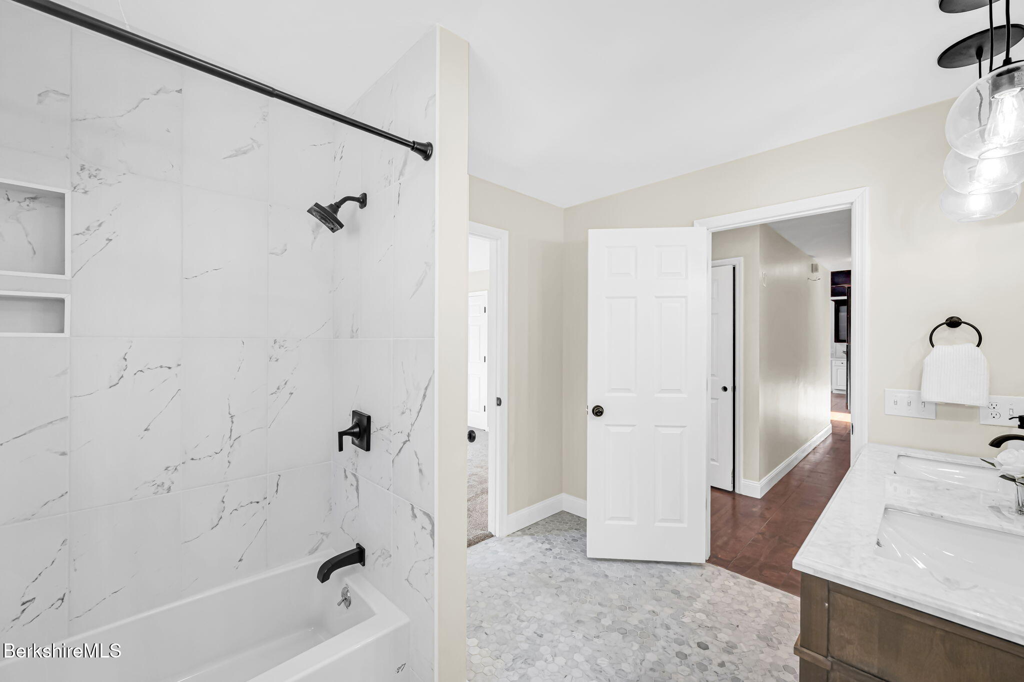 11 E Road Richmond, MA 01254 - Photo 32 of 65 a bathroom with a tub shower and sink