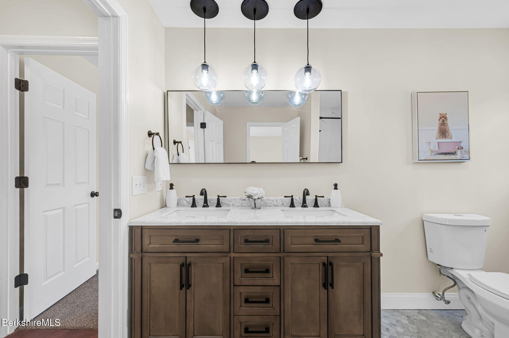 11 E Road Richmond, MA 01254 - Photo 33 of 65 a bathroom with a double vanity sink mirror and toilet