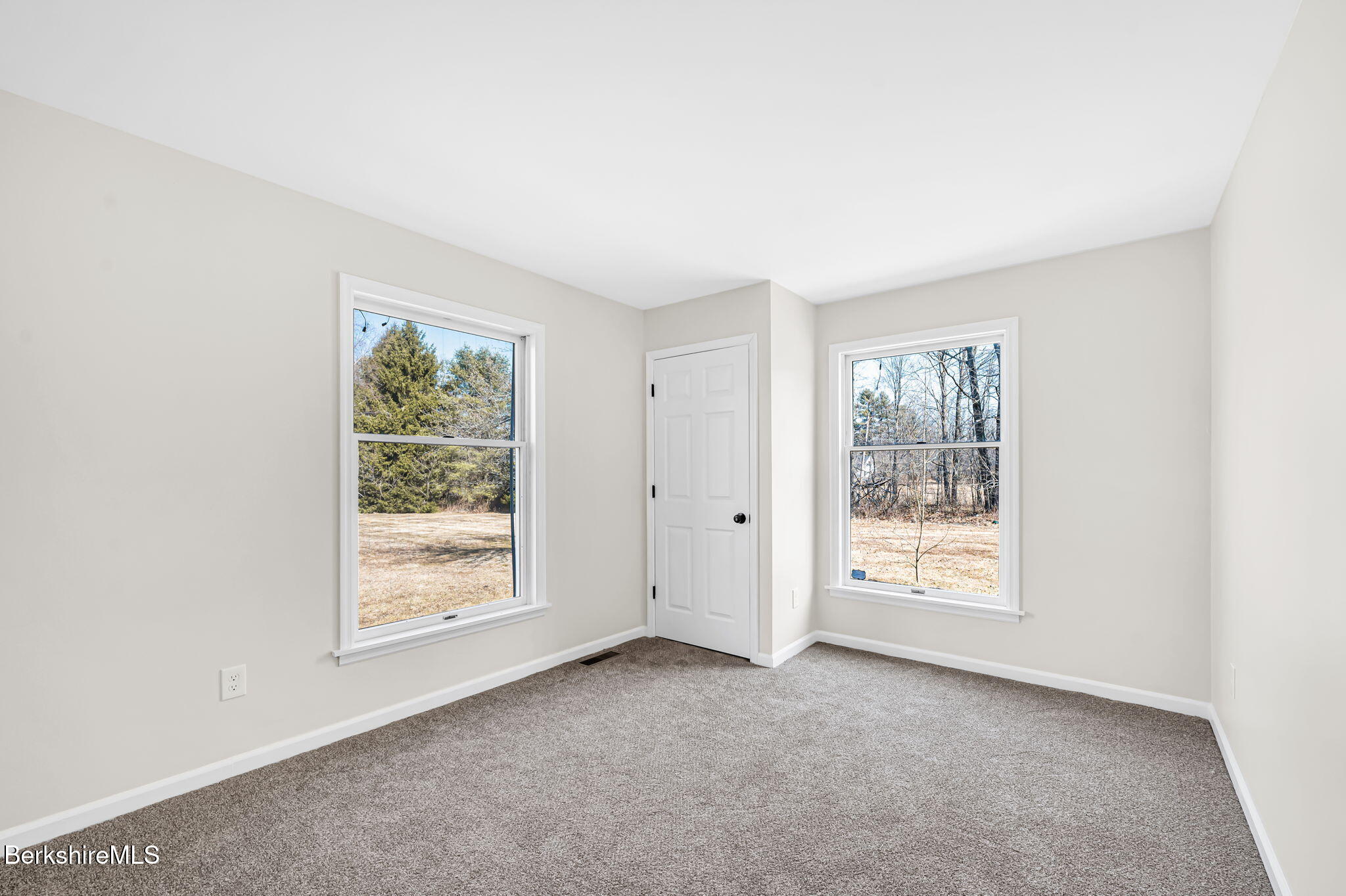 11 E Road Richmond, MA 01254 - Photo 47 of 65 an empty room with windows and closet
