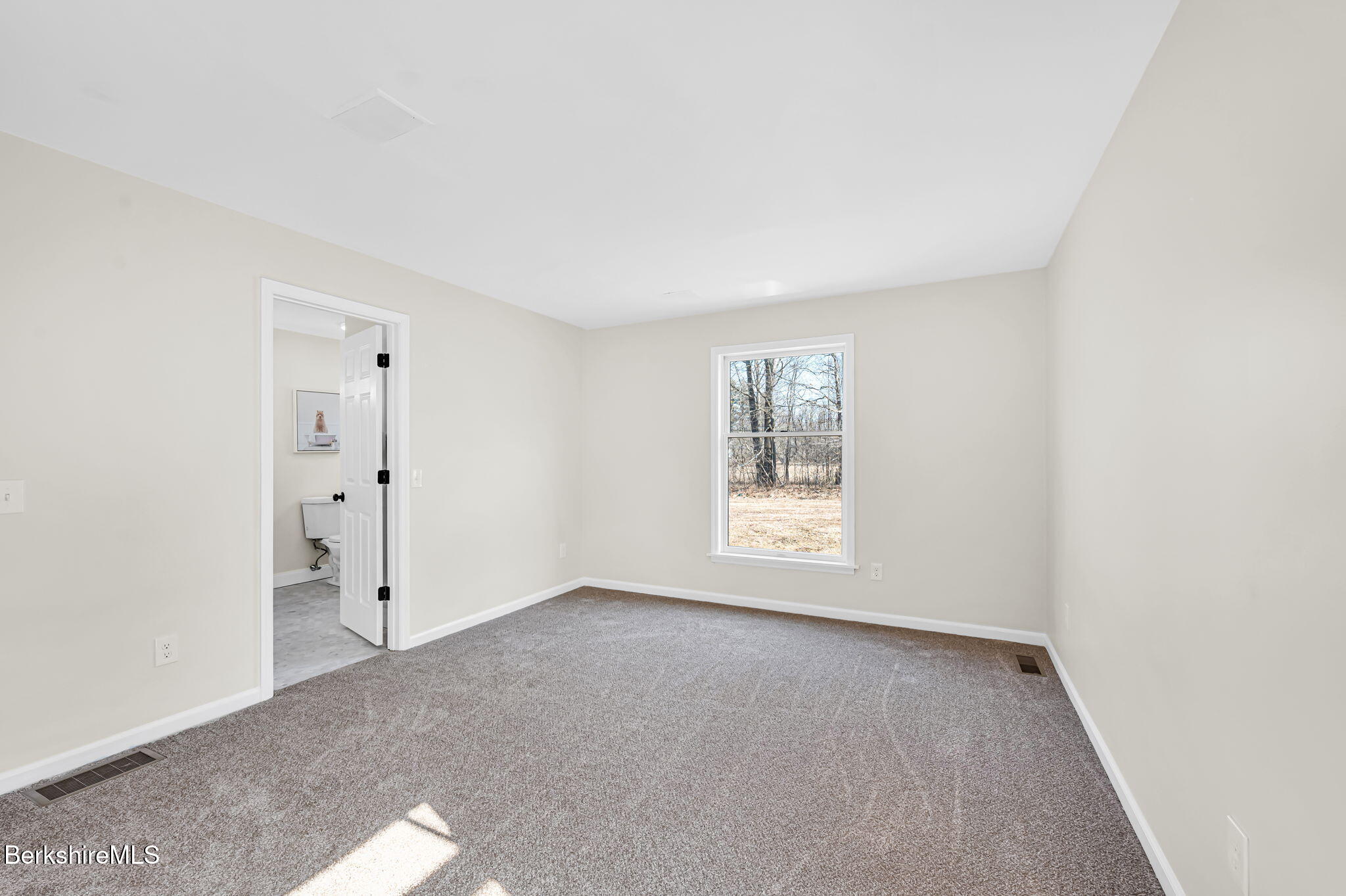11 E Road Richmond, MA 01254 - Photo 53 of 65 a view of an empty room with a window