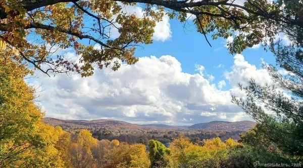 a view of mountain view with mountains in the background
