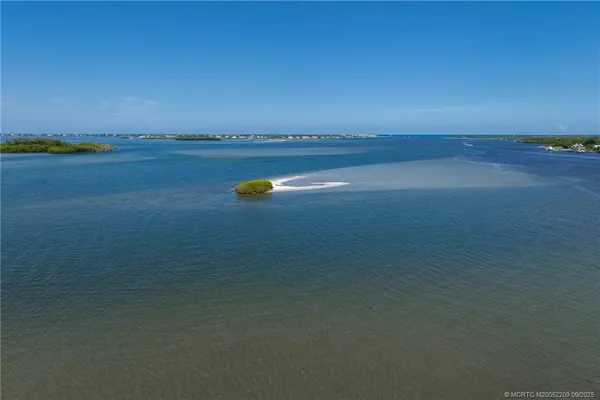 a view of a lake with a city