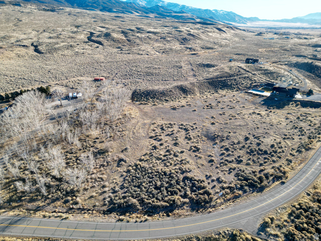 1 East Landslide Road East Monroe, UT 84754 - Photo 4 of 9 Aerial view of property's location featuring a mountain backdrop