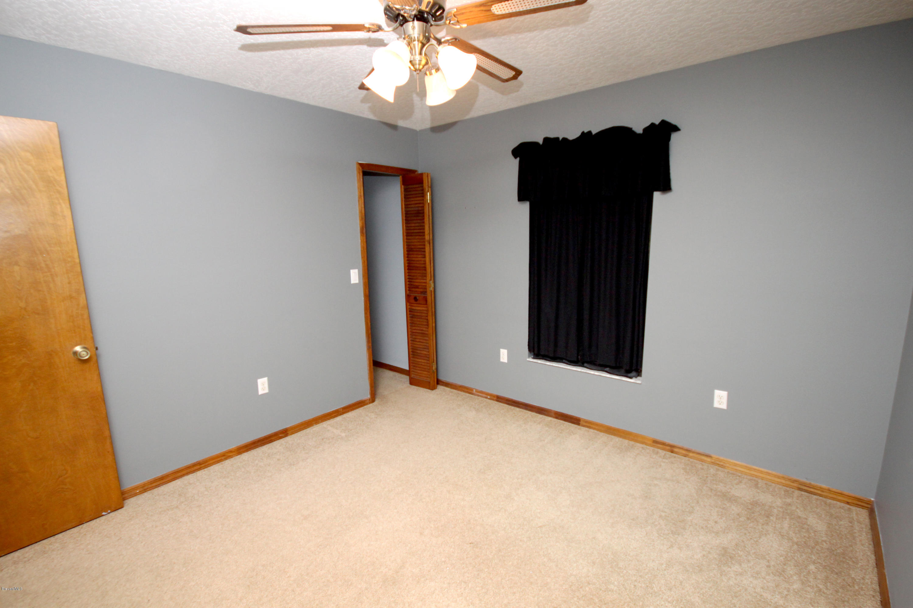 5157 Jamaica Road Cocoa, FL 32927 - Photo 12 of 19 Second Bedroom 1