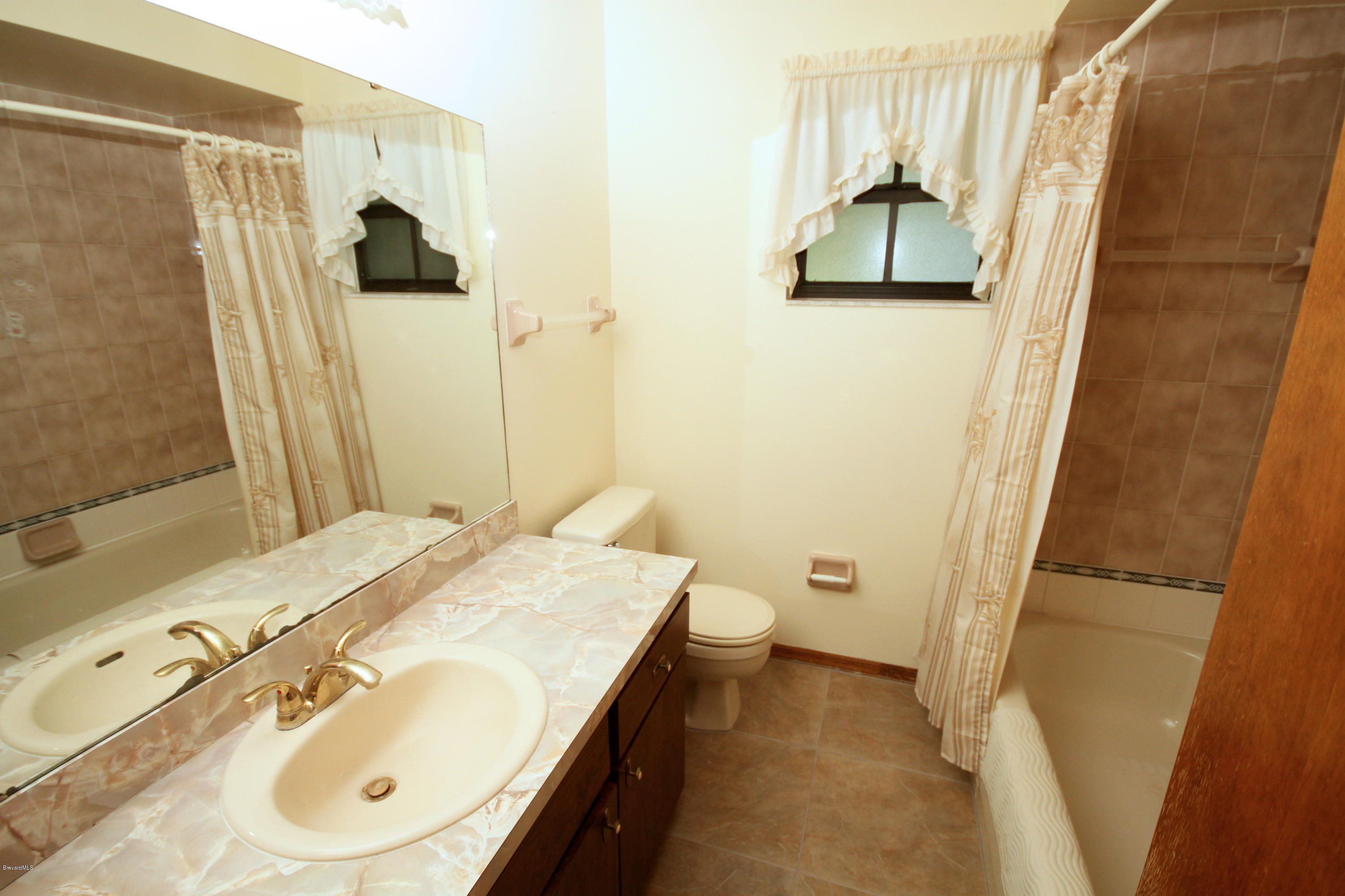 5157 Jamaica Road Cocoa, FL 32927 - Photo 14 of 19 Bathroom 1