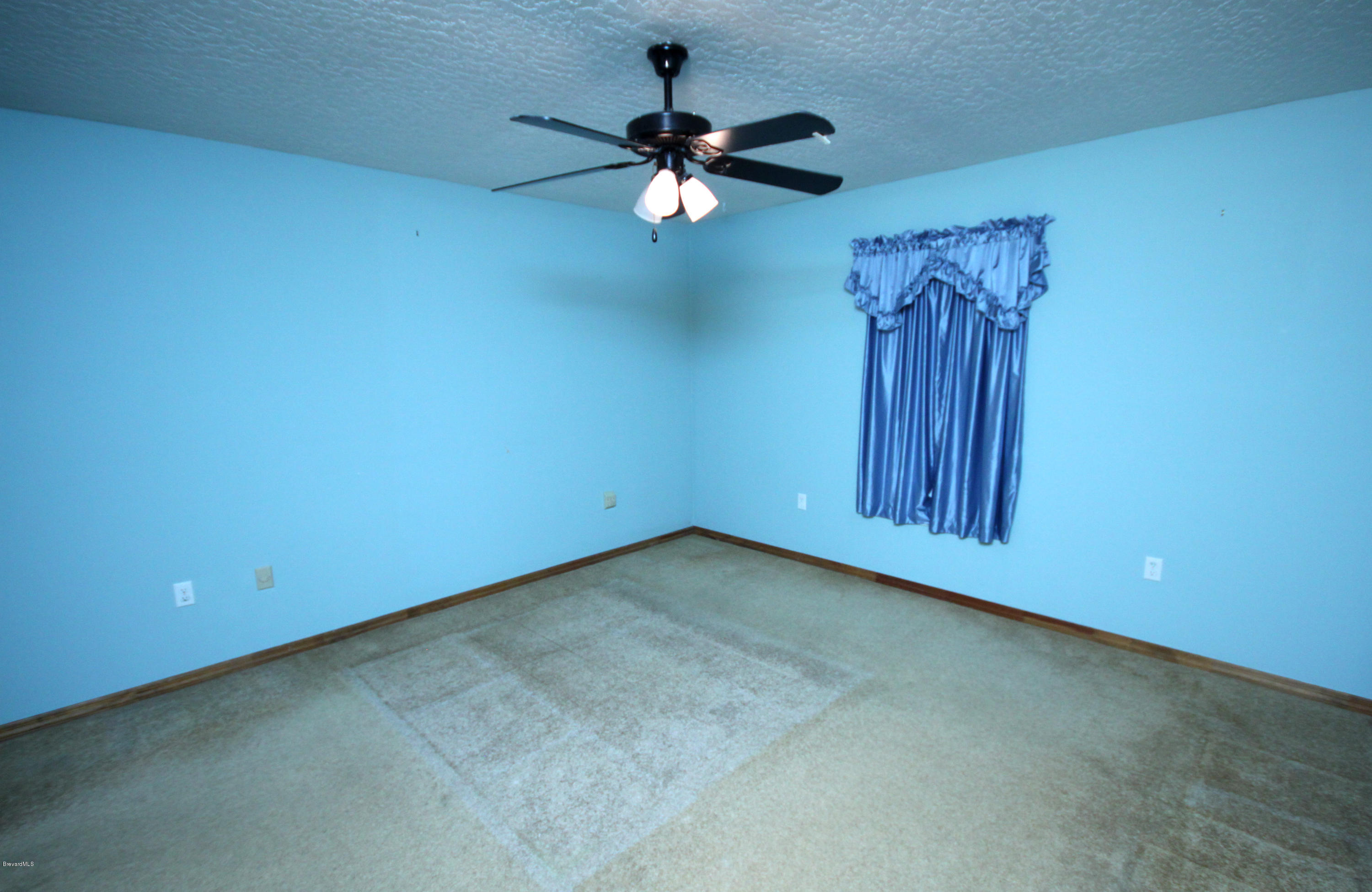 5157 Jamaica Road Cocoa, FL 32927 - Photo 8 of 19 Master Bedroom