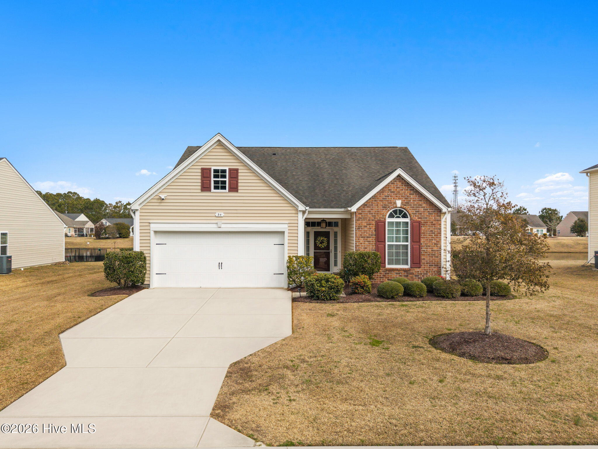 34 Lighthouse Cove Loop, Unit 113 Calabash, NC 28467 - Photo 1 of 47 1-web-or-mls-DJI_20260208114709_0341_D