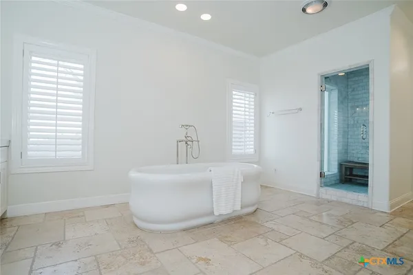 a room with white cabinets