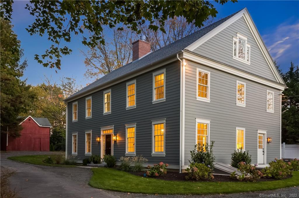 View of the front entrance and antique barn.