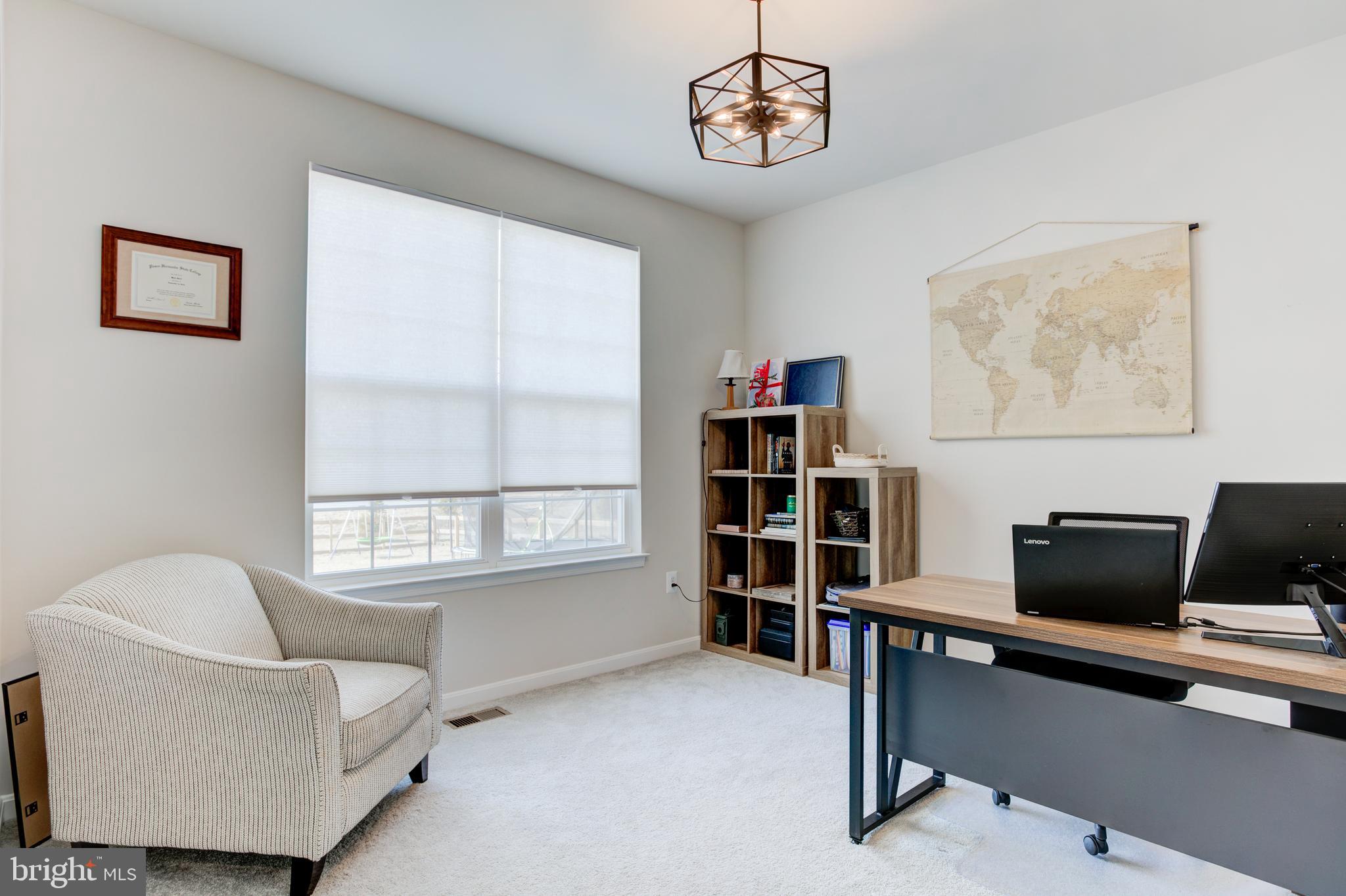 13402 Maymount Drive Culpeper, VA 22701 - Photo 11 of 25 a view of a livingroom with workspace and a window