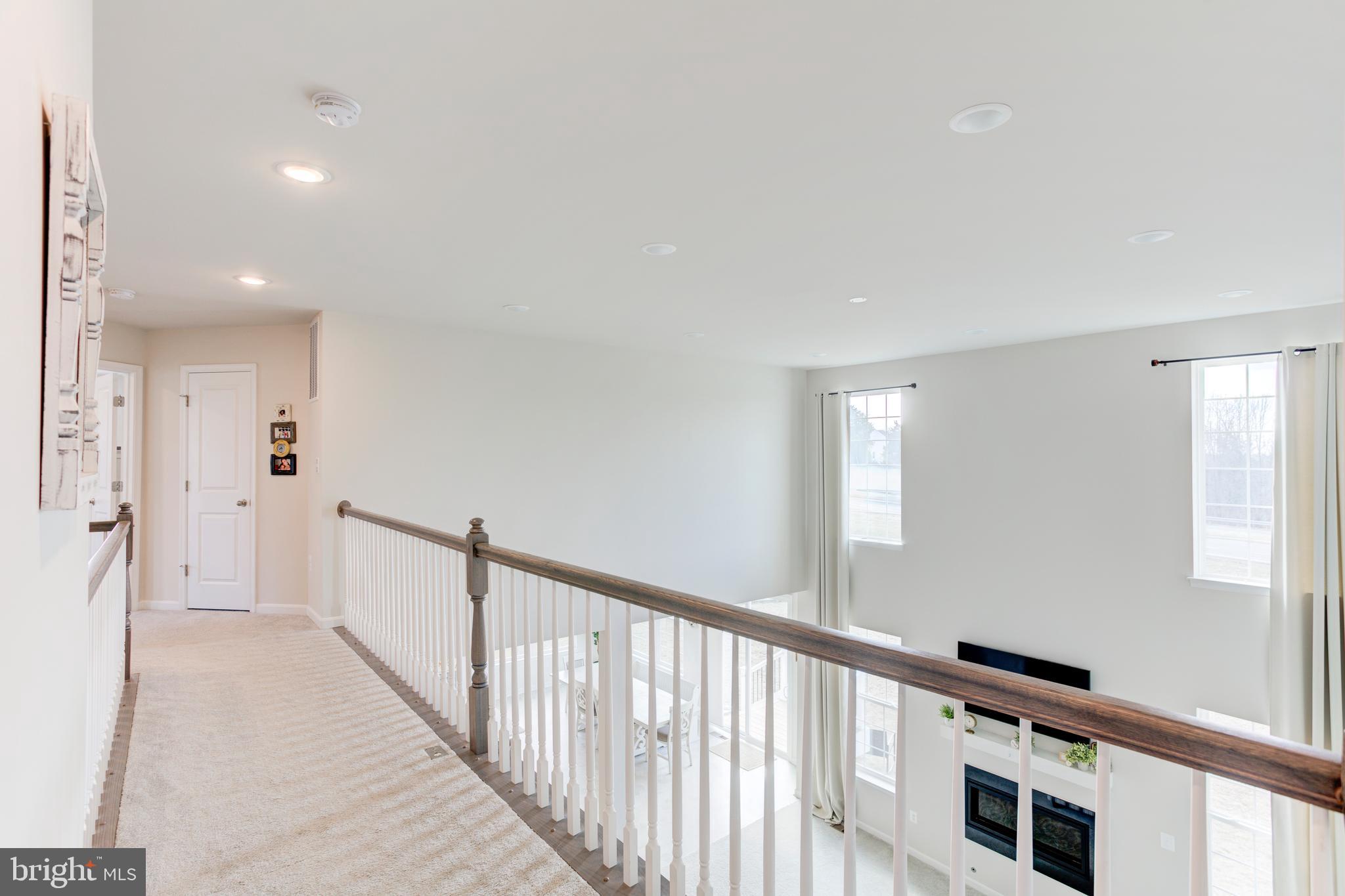 13402 Maymount Drive Culpeper, VA 22701 - Photo 24 of 25 a view of hallway with windows
