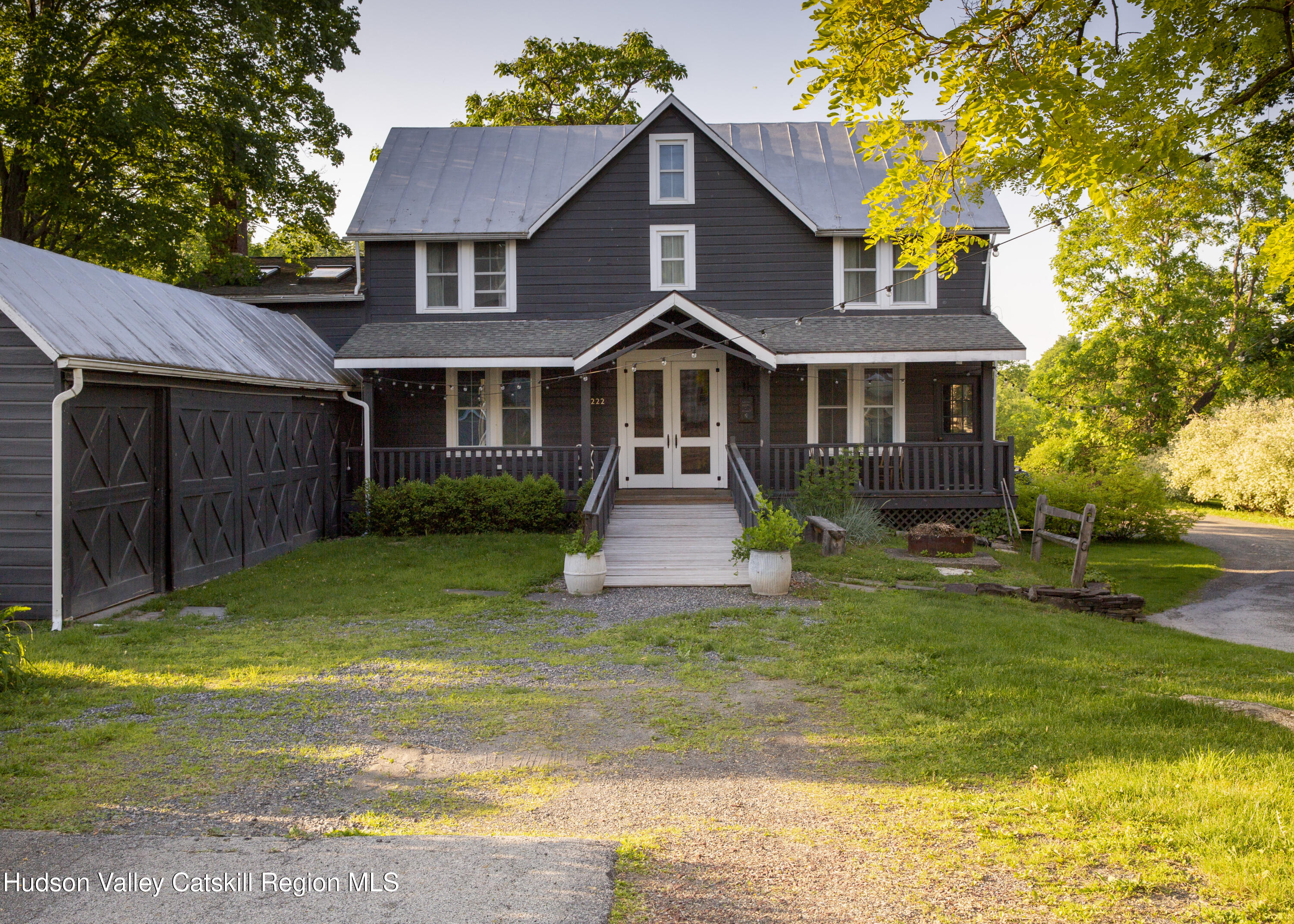 222 Main Street Germantown, NY 12526 - Photo 31 of 36 a front view of a house with yard and green space