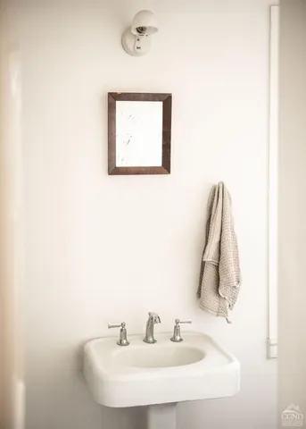 a kitchen that has a sink and a window in it