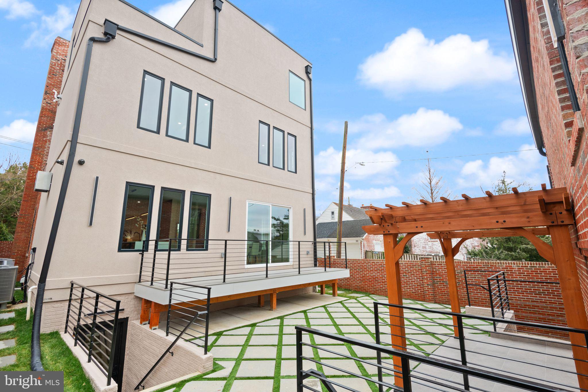 1610 Foxhall Road Northwest Washington, DC 20007 - Photo 15 of 66 a view of a balcony with chairs