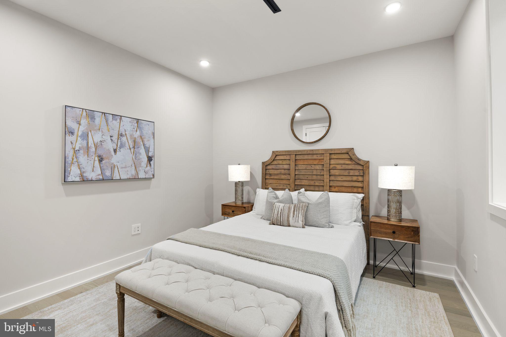 1610 Foxhall Road Northwest Washington, DC 20007 - Photo 20 of 66 a bedroom with a bed and a window