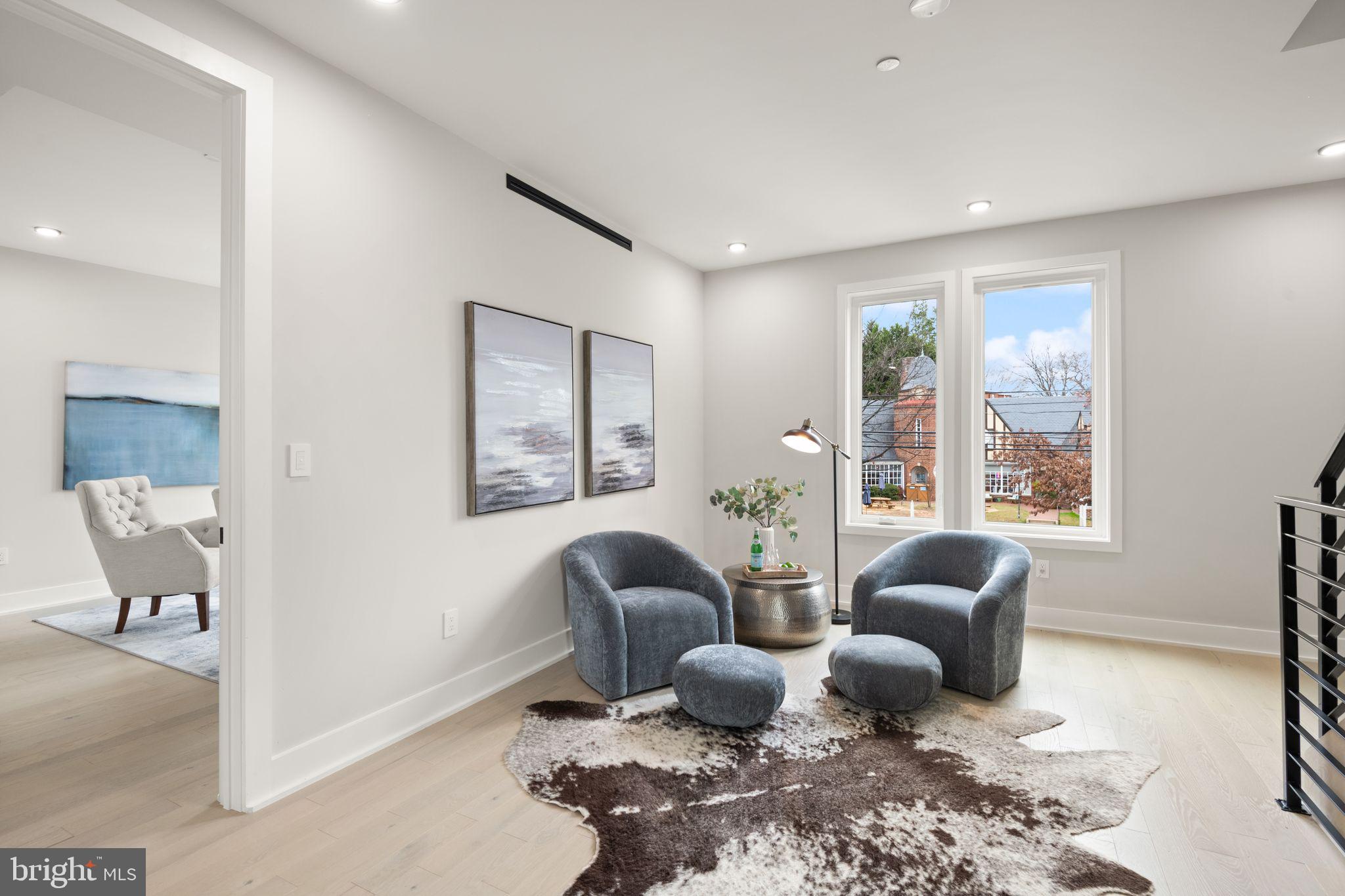 1610 Foxhall Road Northwest Washington, DC 20007 - Photo 29 of 66 a living room with furniture rug and window