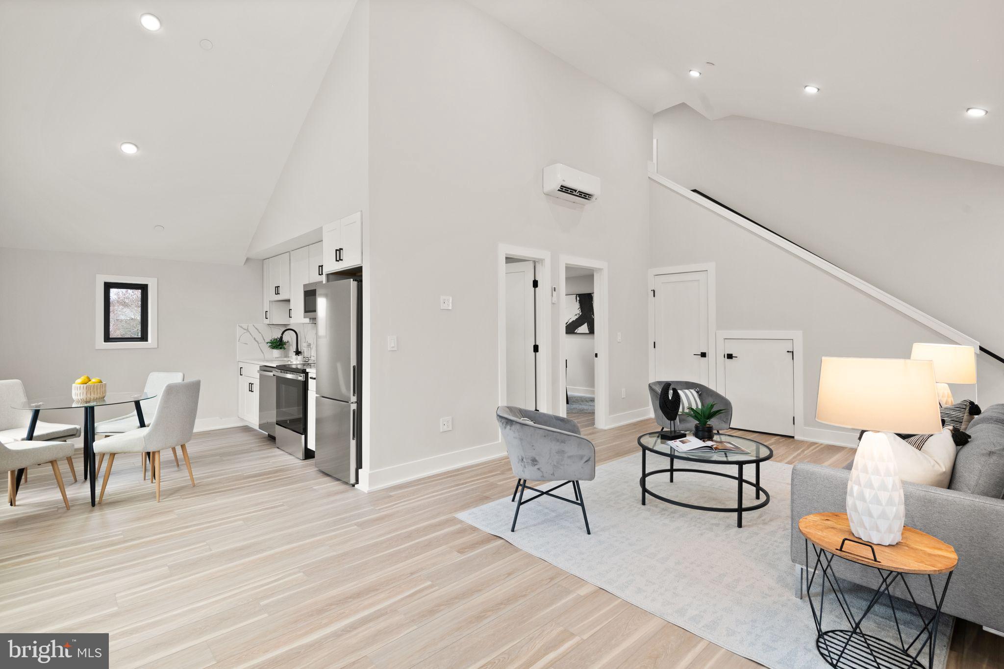 1610 Foxhall Road Northwest Washington, DC 20007 - Photo 55 of 66 a living room with furniture and a wooden floor