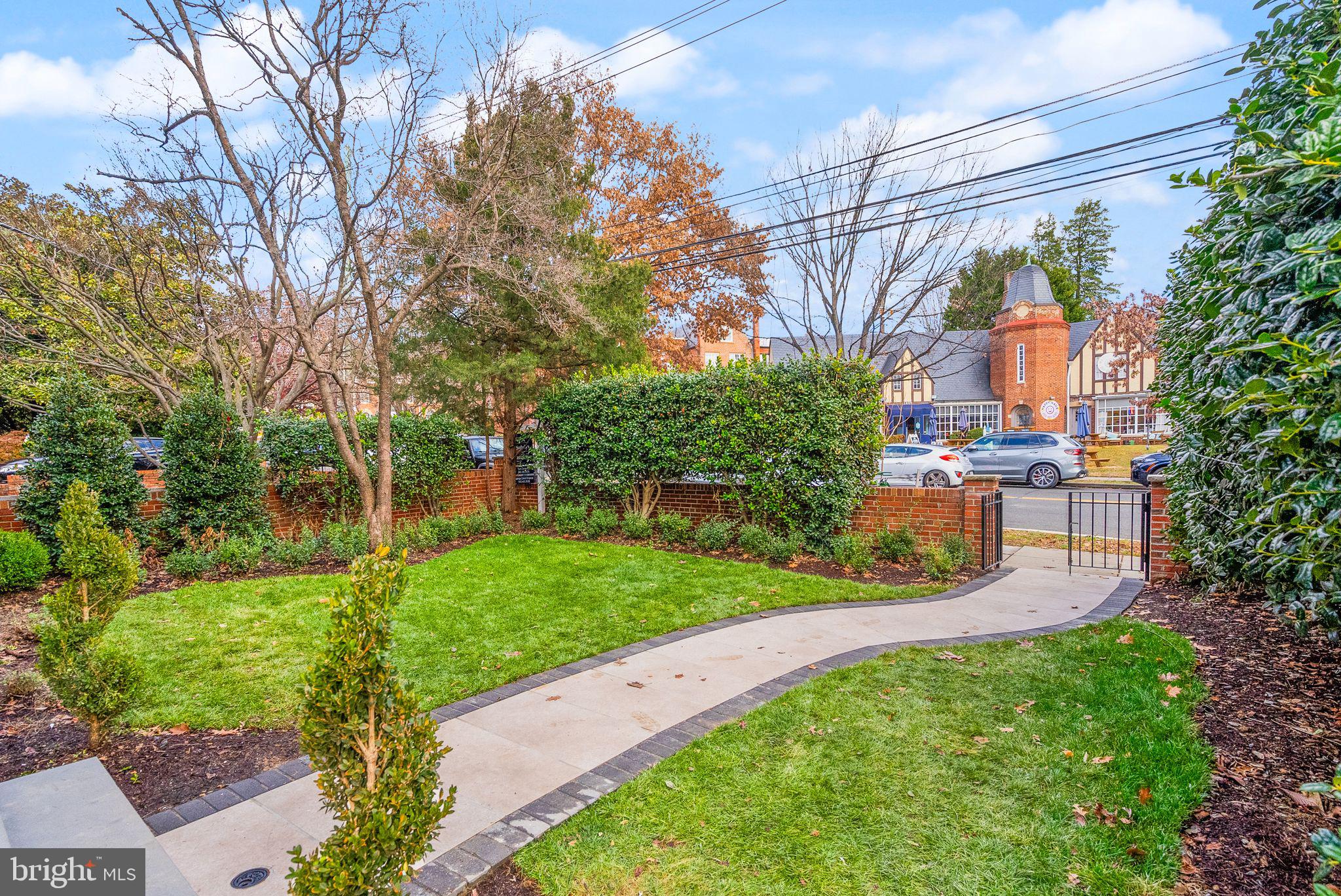 1610 Foxhall Road Northwest Washington, DC 20007 - Photo 6 of 66 a view of a garden with a house
