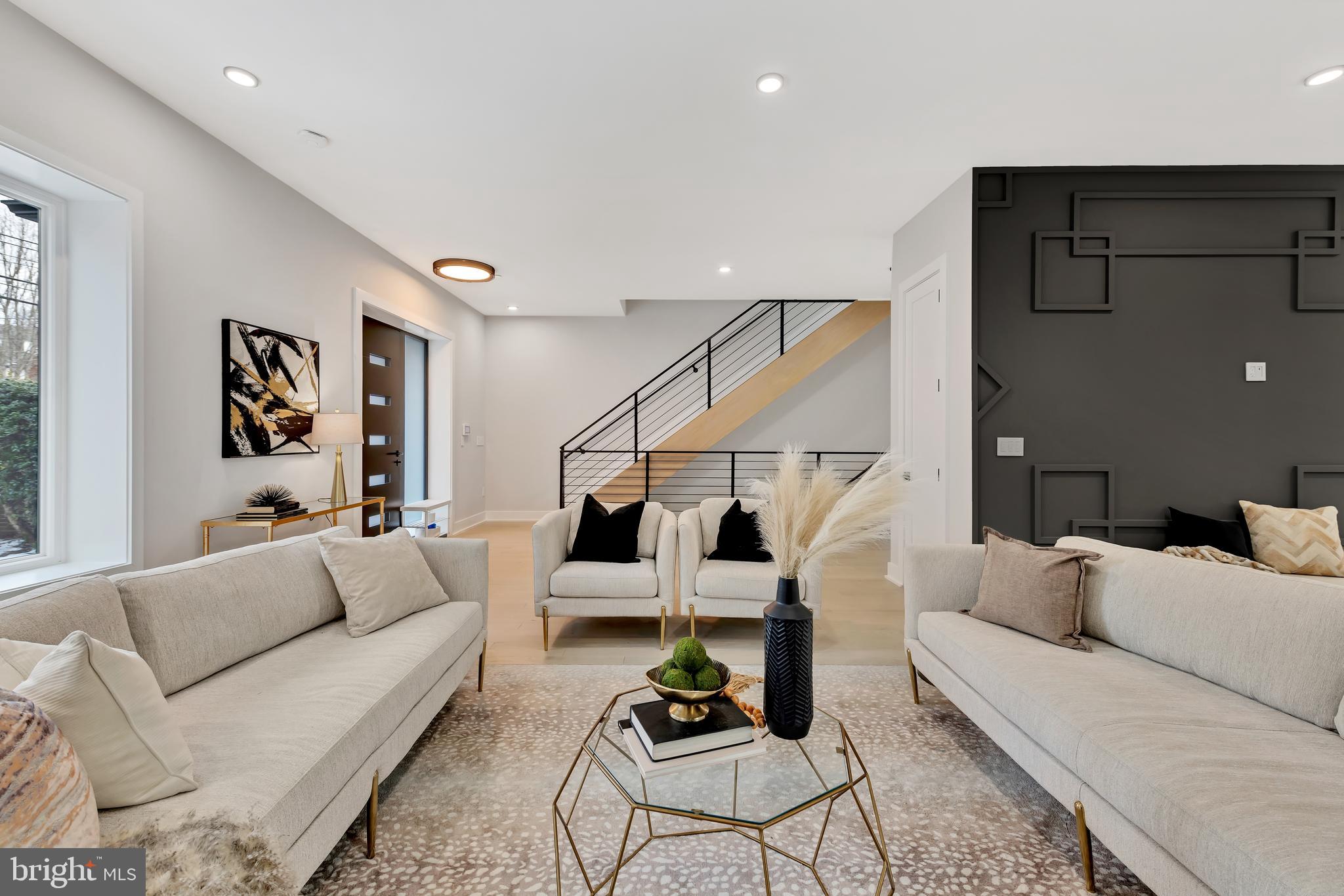 1610 Foxhall Road Northwest Washington, DC 20007 - Photo 9 of 66 a living room with furniture and wooden floor