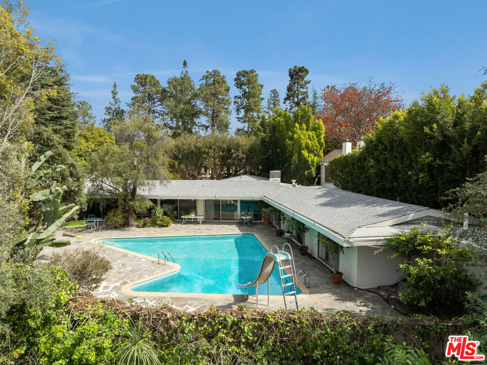 1018 North Crescent Drive Beverly Hills, CA 90210 - Photo 12 of 18 an aerial view of a house with a yard basket ball court and outdoor seating