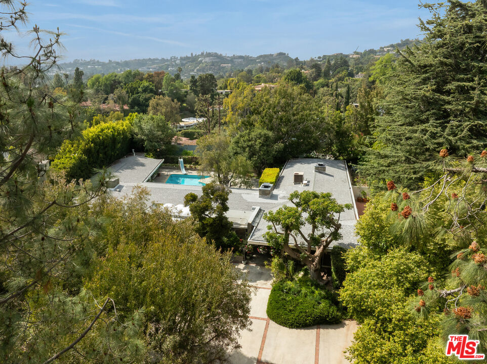 1018 North Crescent Drive Beverly Hills, CA 90210 - Photo 18 of 18 a view of a bunch of trees and houses