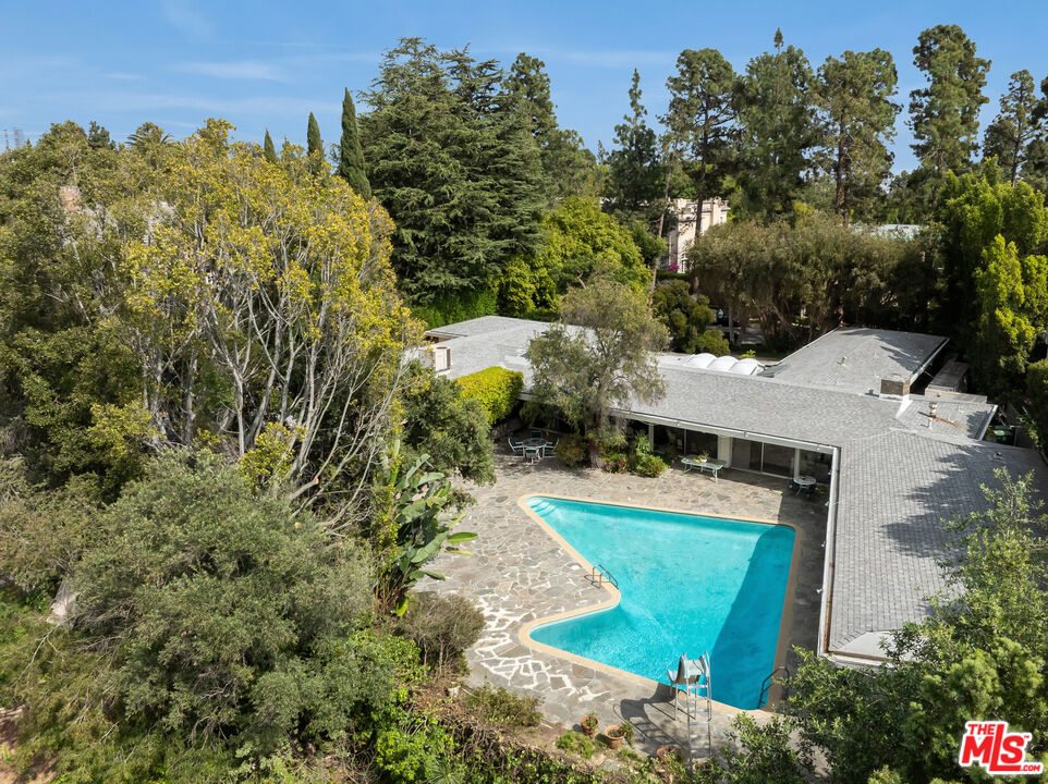 1018 North Crescent Drive Beverly Hills, CA 90210 - Photo 4 of 18 an aerial view of a house with a yard basket ball court and outdoor seating