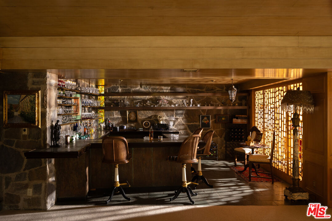 1018 North Crescent Drive Beverly Hills, CA 90210 - Photo 8 of 18 a view of a room with gym equipment