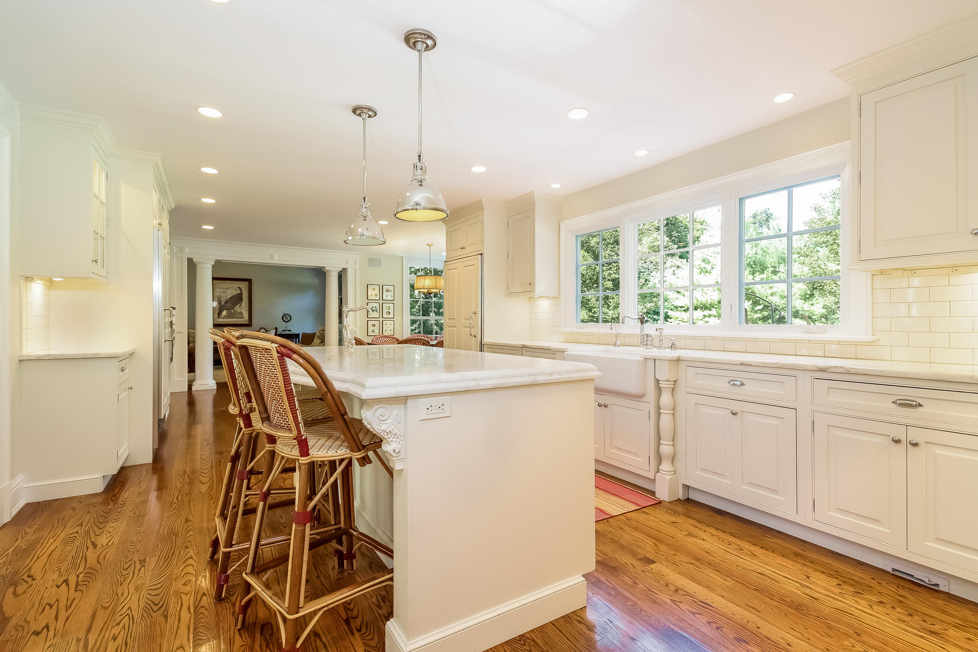 170 Brushy Ridge Road New Canaan, CT 06840 - Photo 20 of 56 a kitchen with stainless steel appliances granite countertop a sink a stove and a wooden floors