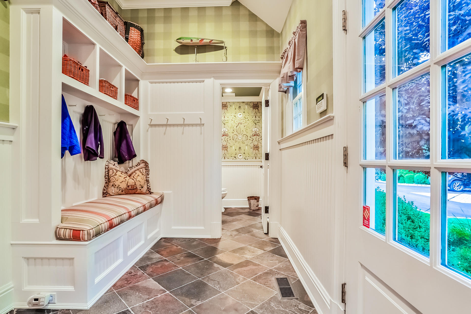 170 Brushy Ridge Road New Canaan, CT 06840 - Photo 25 of 56 a view of an entryway with wooden floor and windows