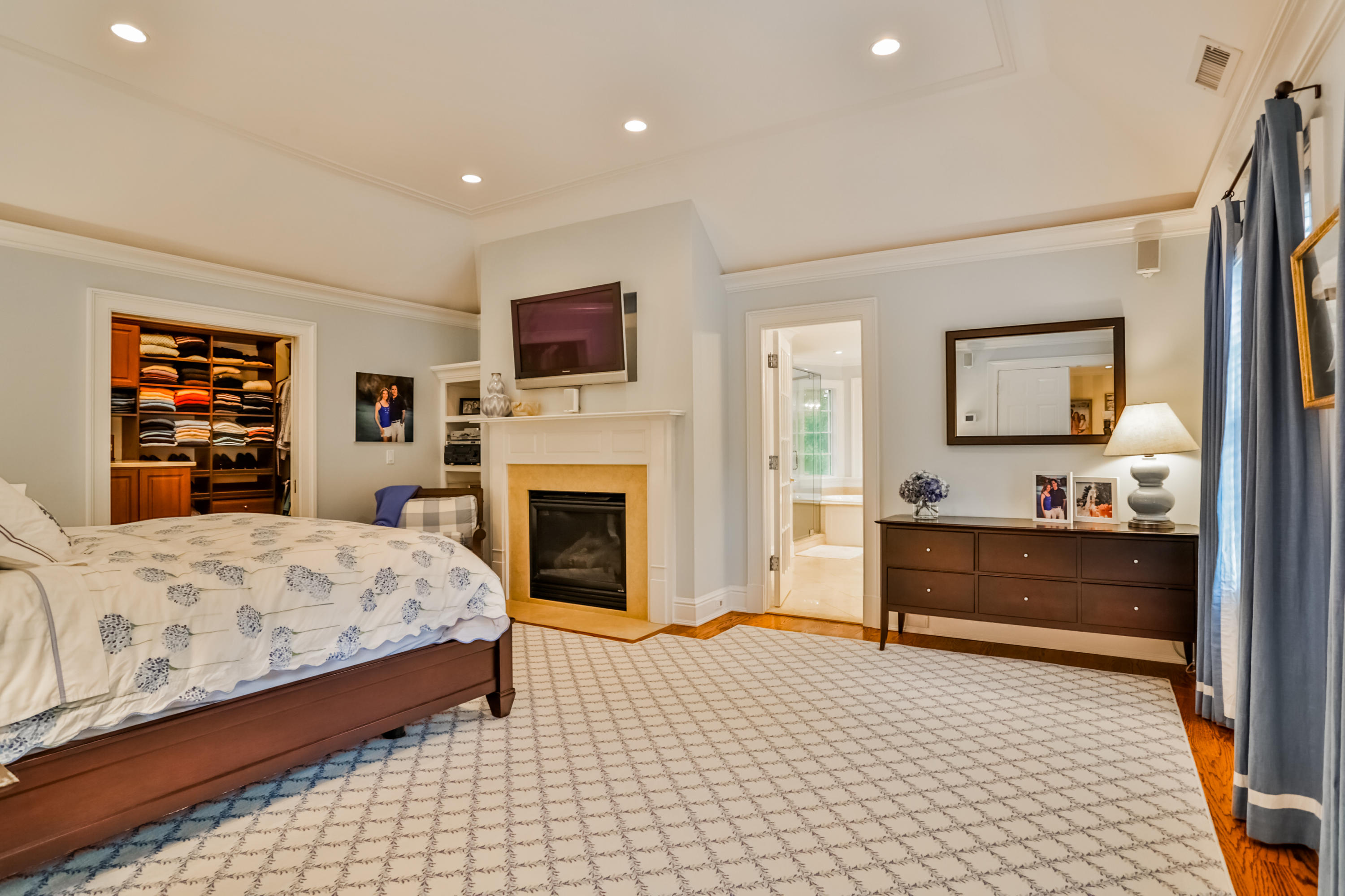 170 Brushy Ridge Road New Canaan, CT 06840 - Photo 28 of 56 a living room with a bed furniture and a flat screen tv