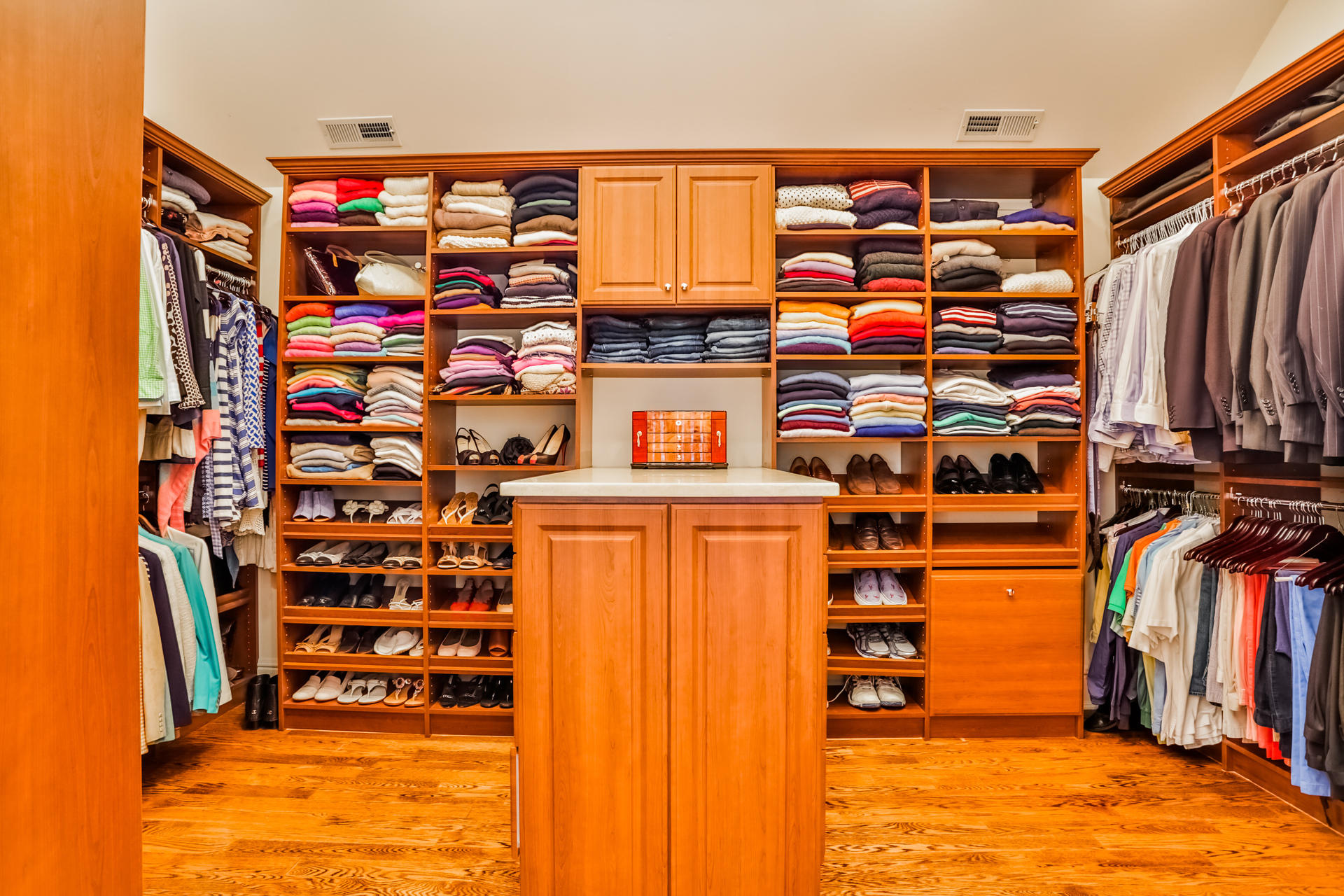 170 Brushy Ridge Road New Canaan, CT 06840 - Photo 29 of 56 a view of walk in closet with clothes and shoes