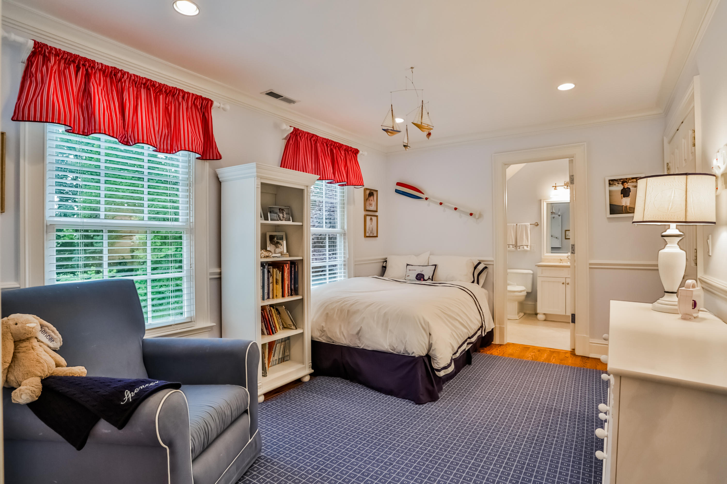 170 Brushy Ridge Road New Canaan, CT 06840 - Photo 34 of 56 a spacious bedroom with a bed couch and a window