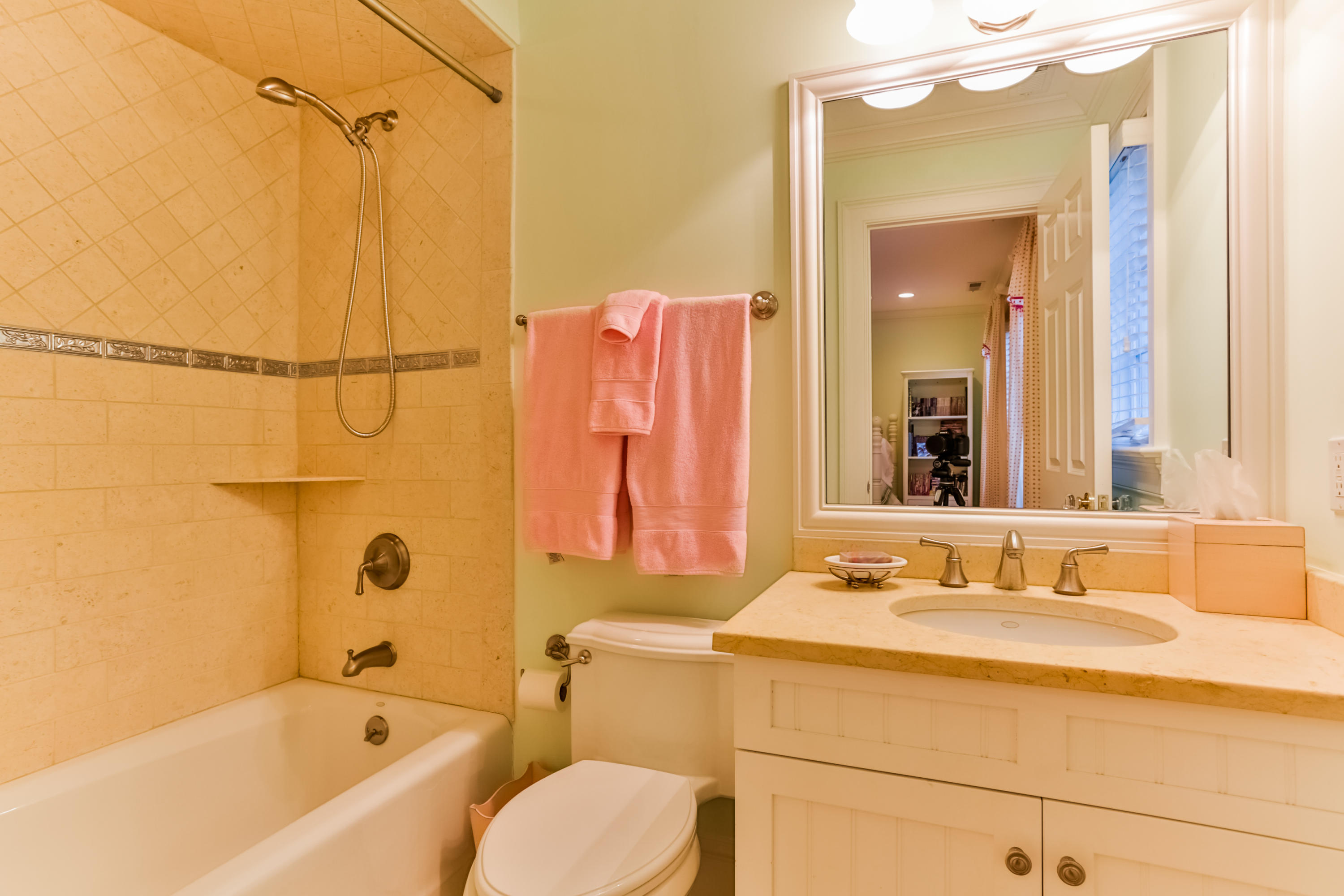 170 Brushy Ridge Road New Canaan, CT 06840 - Photo 40 of 56 a bathroom with a sink mirror toilet and bathtub