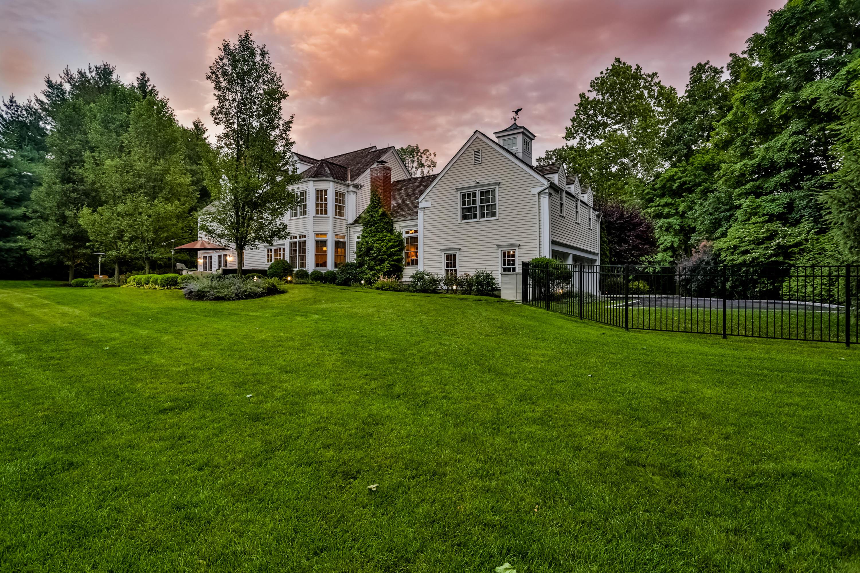 170 Brushy Ridge Road New Canaan, CT 06840 - Photo 51 of 56 a view of a house with a yard