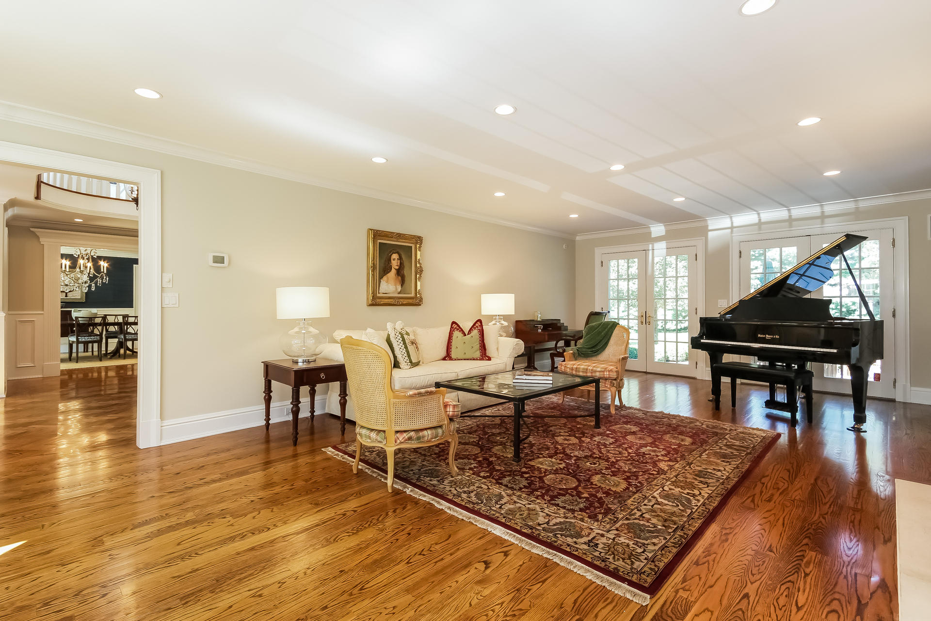170 Brushy Ridge Road New Canaan, CT 06840 - Photo 10 of 56 a living room with furniture a coffee table and kitchen view