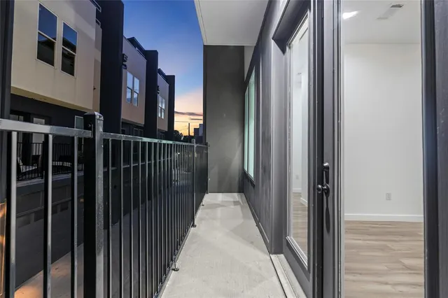 a view of kitchen with sink microwave and stove