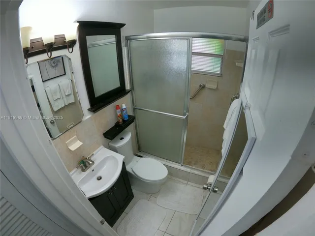 a bathroom with a sink and toilet