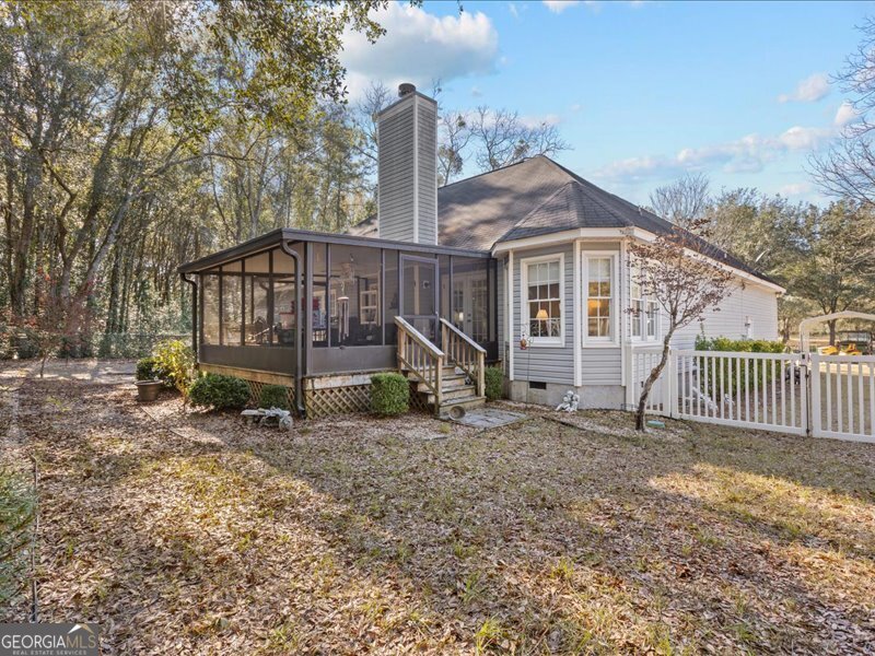 1508 Liberty Expressway Albany, GA 31705 - Photo 28 of 55 a view of a house with a yard and wooden fence