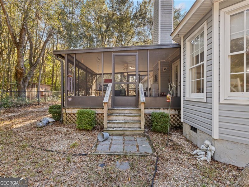 1508 Liberty Expressway Albany, GA 31705 - Photo 29 of 55 a front view of a house with a yard