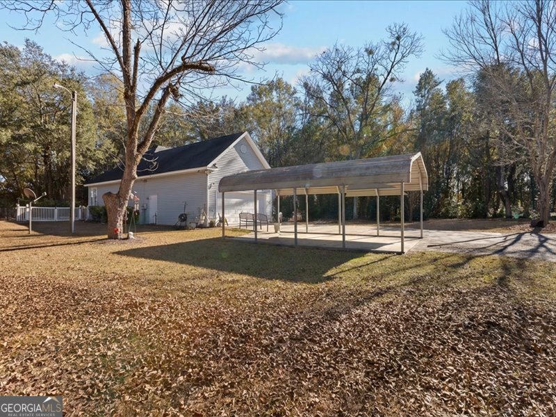 1508 Liberty Expressway Albany, GA 31705 - Photo 37 of 55 a house with trees in the background