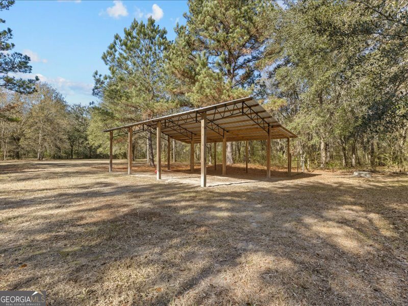1508 Liberty Expressway Albany, GA 31705 - Photo 39 of 55 a view of a house with backyard and trees
