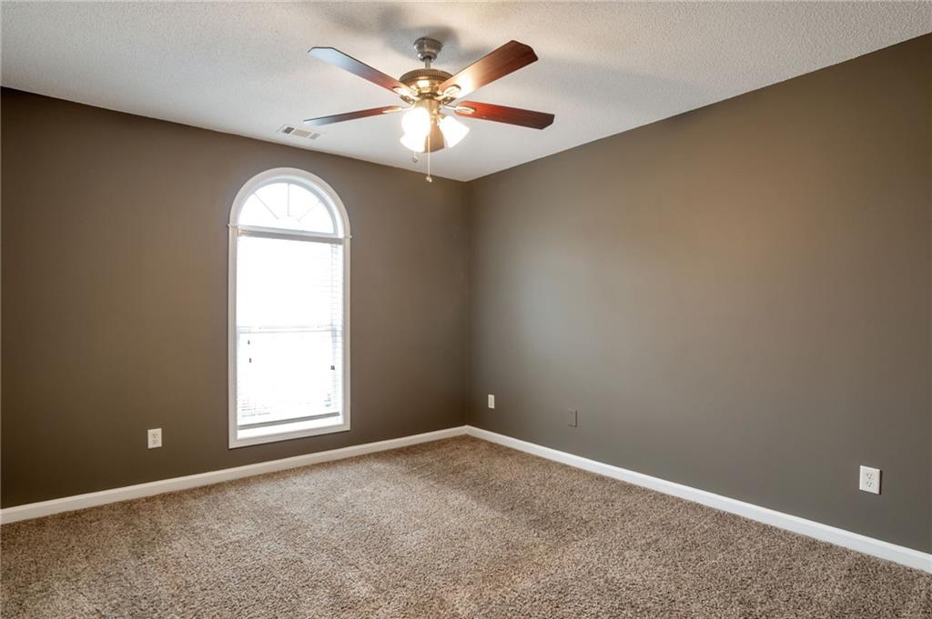 4598 Jackam Ridge Court Lithonia, GA 30038 - Photo 20 of 25 an empty room with a window