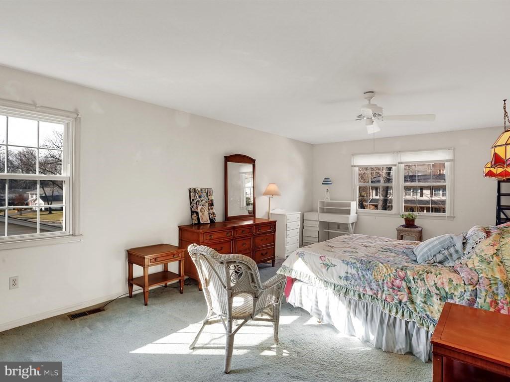9115 Rockefeller Lane Springfield, VA 22153 - Photo 20 of 29 a bedroom with furniture and a bed