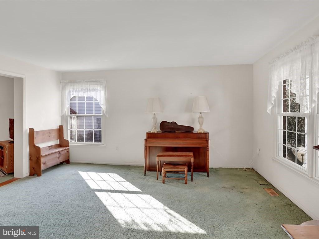 9115 Rockefeller Lane Springfield, VA 22153 - Photo 10 of 29 a room with furniture and windows